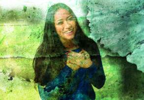 Smiling woman with hands clasped together in gratitude, superimposed on a textured green and gray watercolor background.