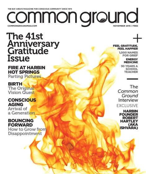 Cover of Common Ground magazine, November 2015 edition, featuring bold orange and yellow flames with a text overlay discussing various articles.