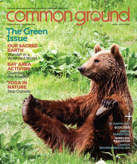 Cover of Common Ground magazine, featuring a brown bear sitting in a yoga pose on grass, with text about environmental themes.