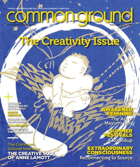 Cover of "common ground" magazine from May 2014 featuring an illustration of a baby within a glowing orb, with various article headlines around the edges.