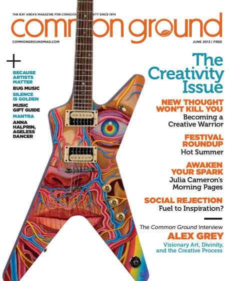 Magazine cover featuring a colorful, ornate guitar illustration with bold text headlines about creativity and interviews in June 2013.