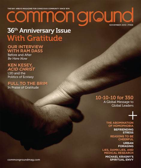 Cover of "common ground" magazine featuring a close-up of two hands clasped, with text detailing the November 2010 issue contents, including an interview titled "With Gratitude.