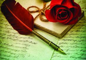 A red rose, quill pen, and tied stack of love letters with elegant cursive handwriting on a vintage background.