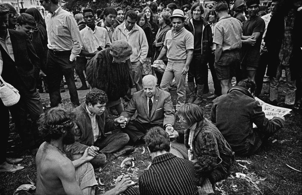 Hippies and tourists meditate in Golden Gate Park