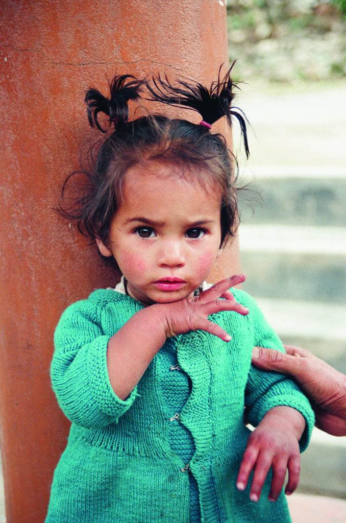 baby girl in blue clothes