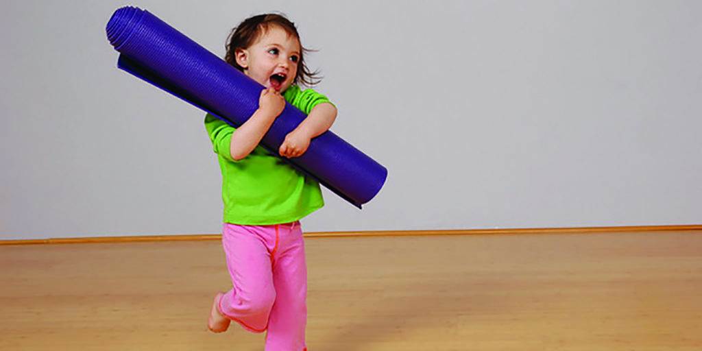 child with rug