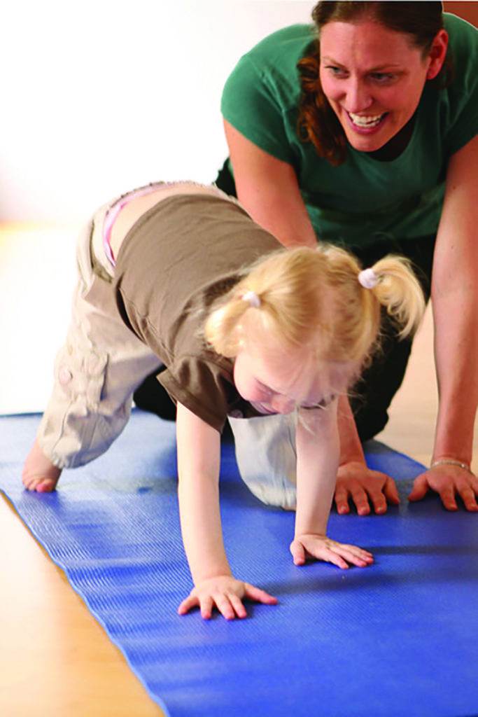 the child is doing yoga