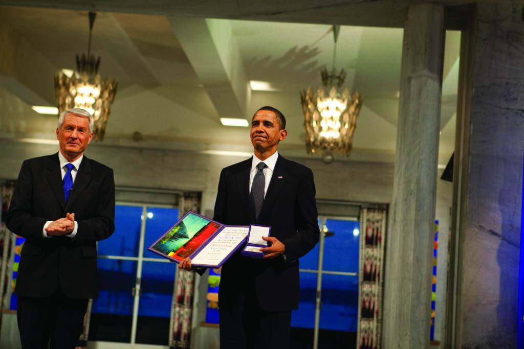 Receiving Nobel Peace Prize from Thorbjørn Jagland in Oslo, Dec. 2009