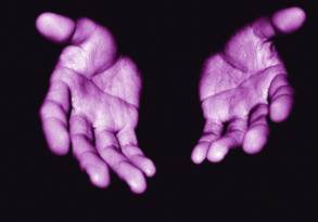 Two open hands displayed palms up, with a purple hue, isolated against a black background, symbolizing the last words.