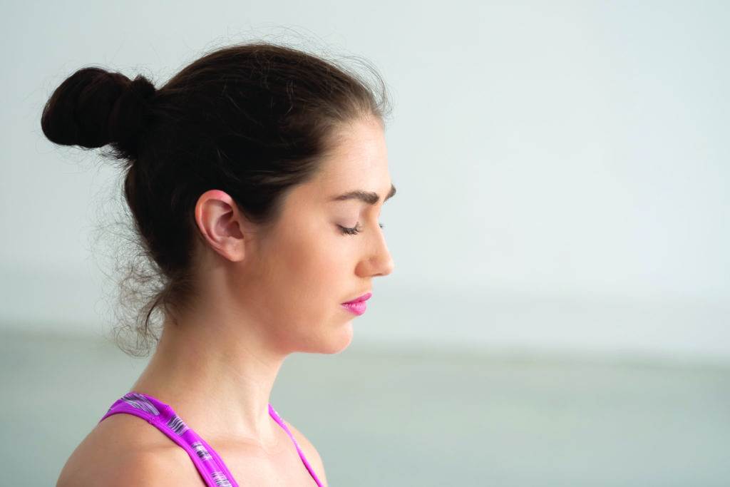 young woman with closed eyes