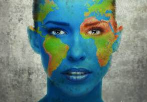 A woman's face painted with a world map, featuring vibrant colors against a textured gray background, showcasing the Power of Being an Earth Empath.