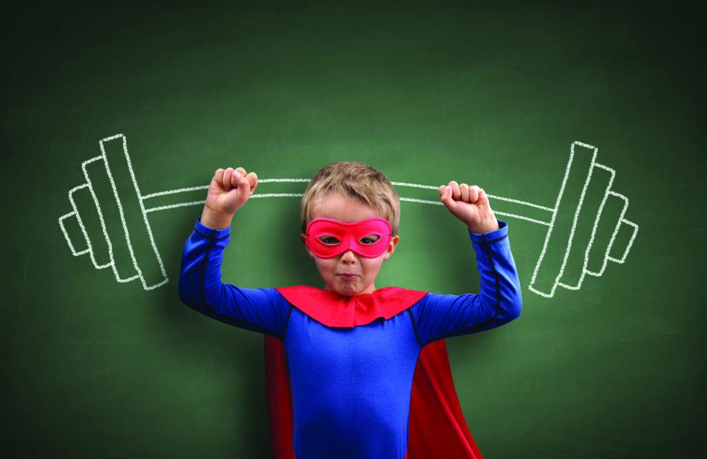 boy in superman costume