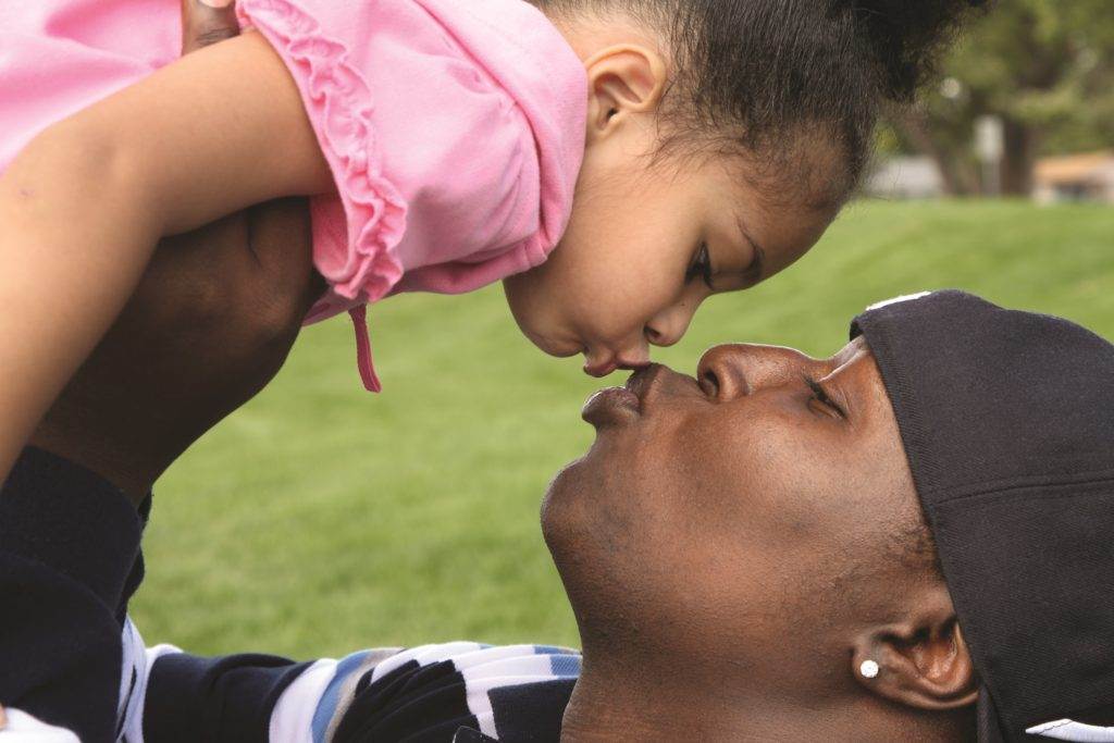 father and his daughter kiss