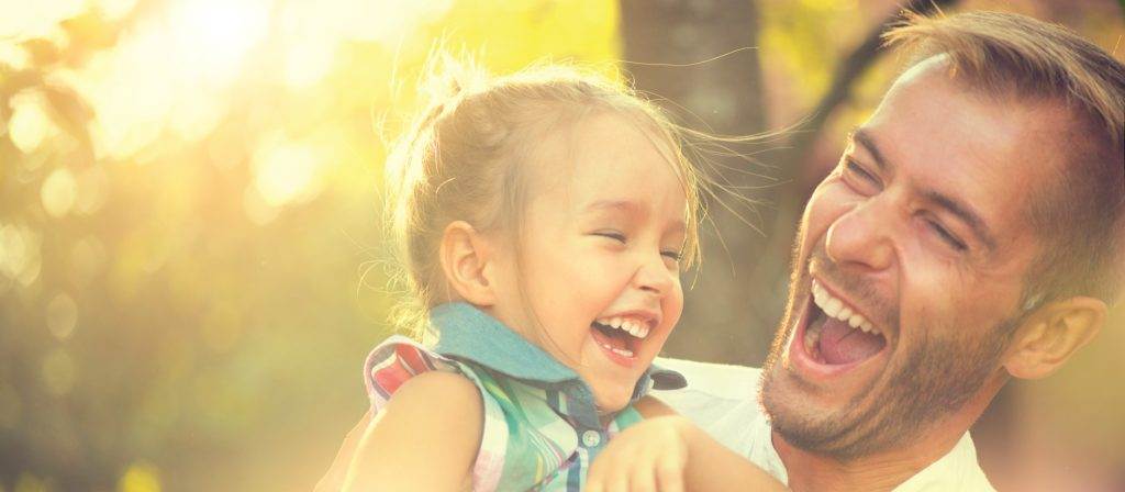 father and his daughter laugh