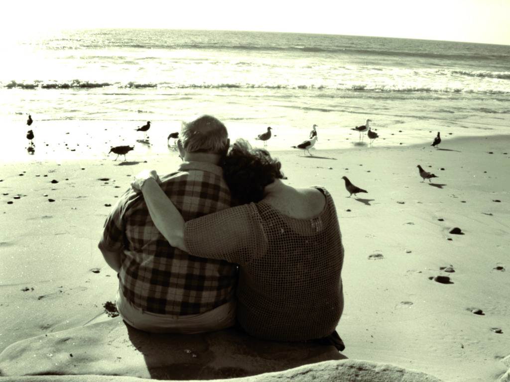 man and woman at the coast